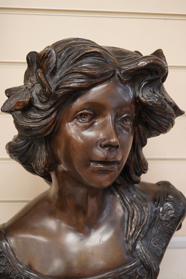 After Moreau, 20th century bronzed patinated bust of a girl, 70cm high